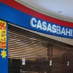 Justiça suspende demissões coletivas nas Casas Bahia e determina reintegração provisória